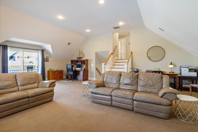 living room featuring carpet floors and vaulted ceiling