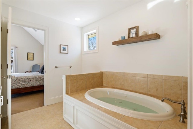 bathroom featuring a bathing tub and lofted ceiling