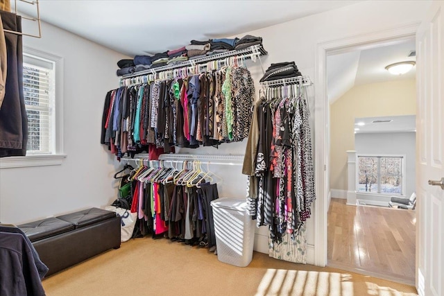 walk in closet featuring hardwood / wood-style floors