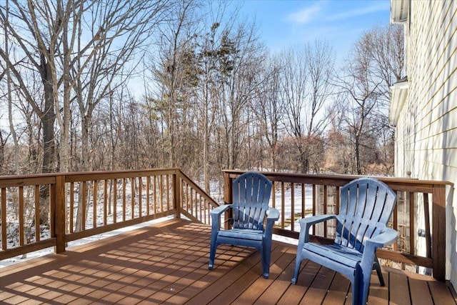 view of snow covered deck