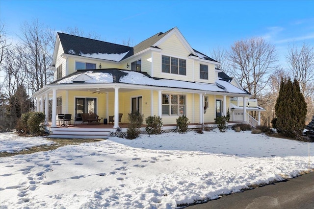 view of front of property with ceiling fan and a porch