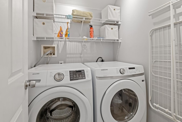 laundry area with washer and dryer