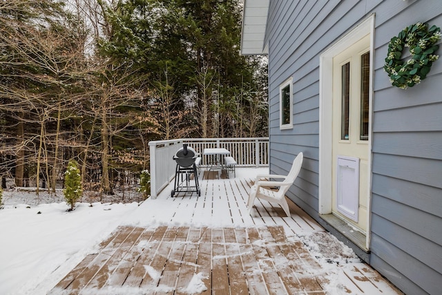 view of snow covered deck