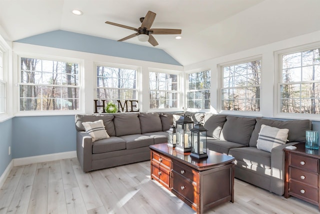 sunroom with vaulted ceiling and ceiling fan