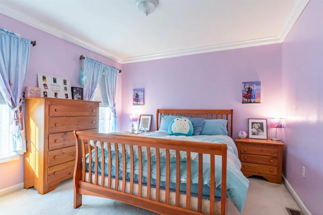 carpeted bedroom featuring multiple windows and crown molding