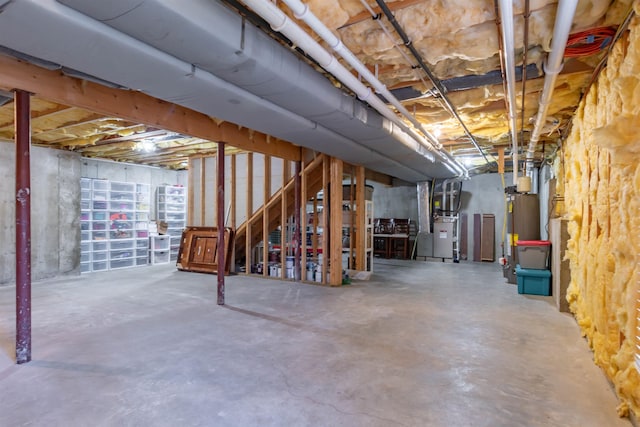 basement with heating unit and gas water heater