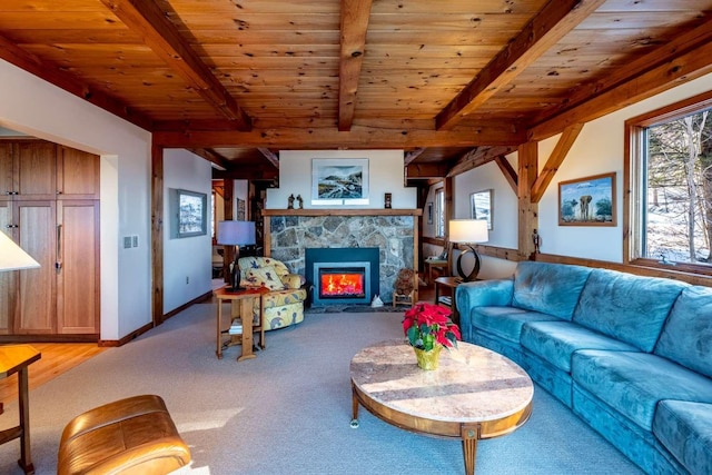 living room featuring wooden ceiling, light colored carpet, a fireplace, and beam ceiling