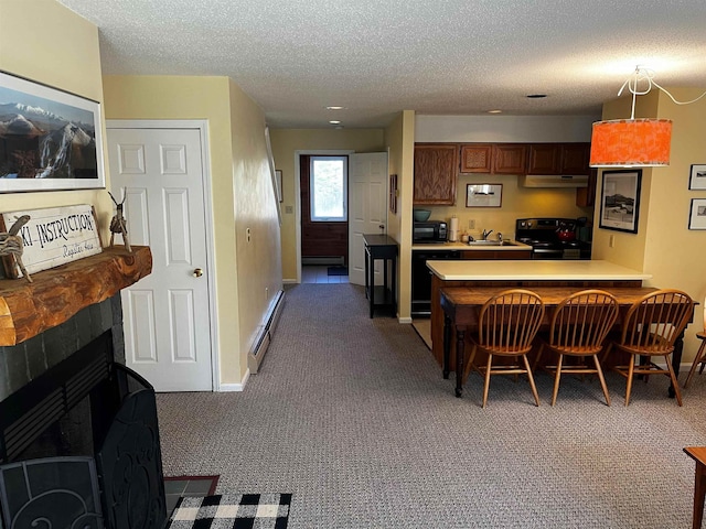 kitchen featuring dark colored carpet, a textured ceiling, baseboard heating, kitchen peninsula, and range with electric cooktop