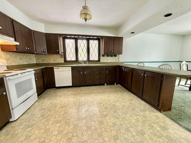 kitchen with sink, white appliances, dark brown cabinets, and backsplash