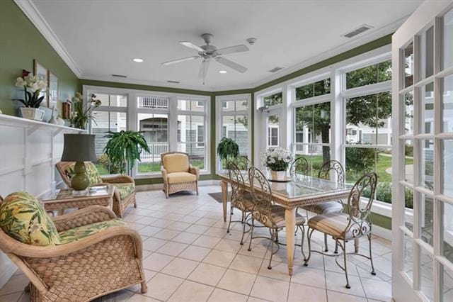 sunroom / solarium with ceiling fan