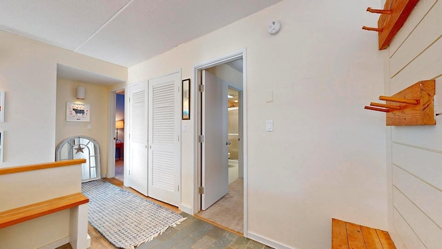 hallway featuring light hardwood / wood-style flooring