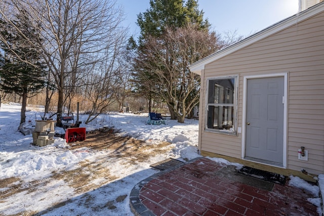 view of yard covered in snow