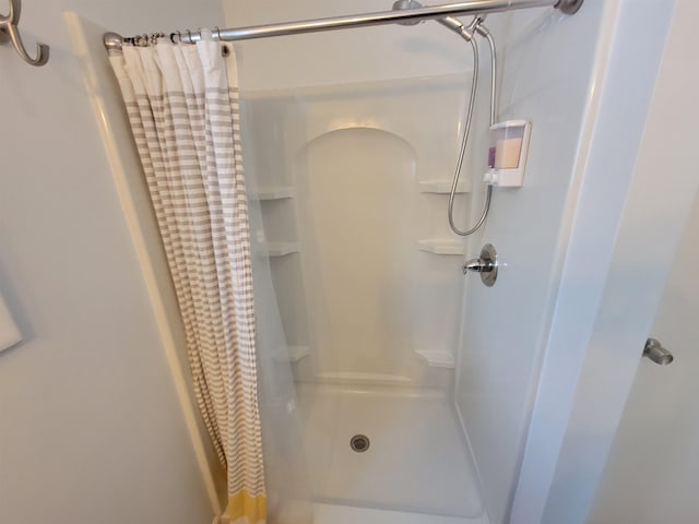 bathroom with walk in shower