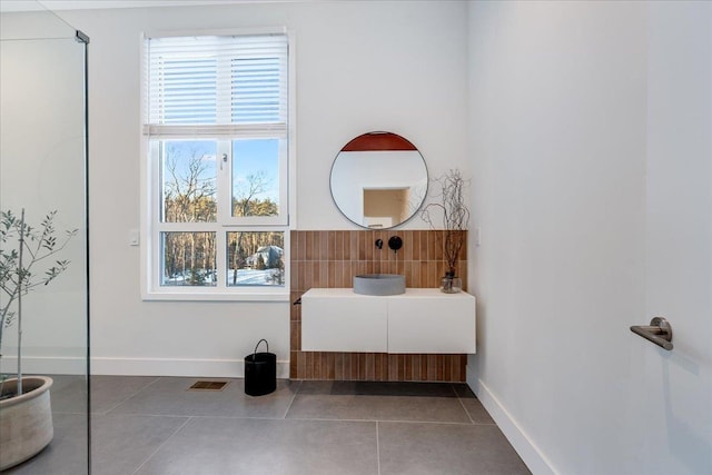 bathroom with tile patterned flooring