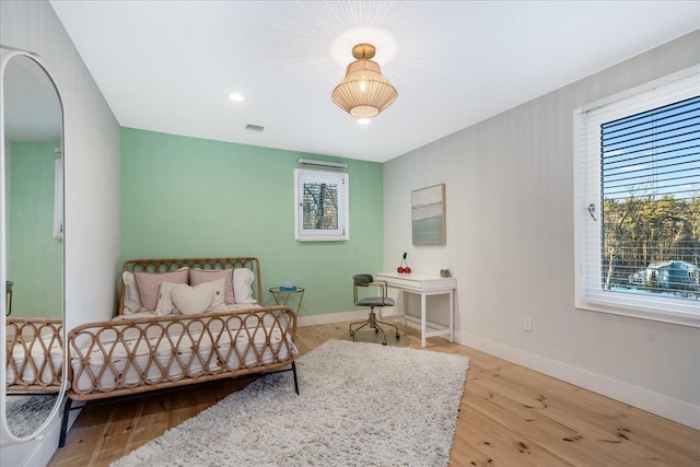 bedroom featuring light hardwood / wood-style floors