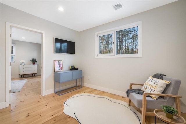 living area featuring hardwood / wood-style flooring