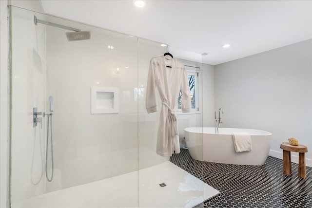 bathroom featuring plus walk in shower