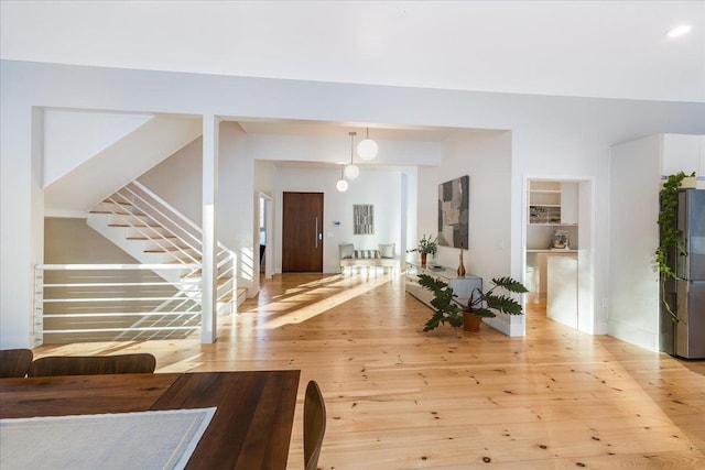 entryway with light wood-type flooring