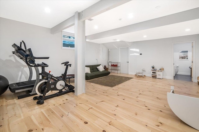 workout room with hardwood / wood-style floors