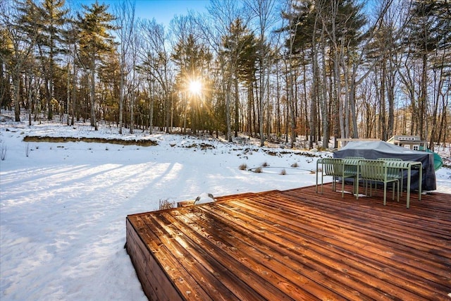 view of snow covered deck