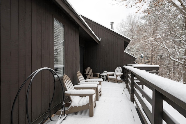 view of snow covered patio