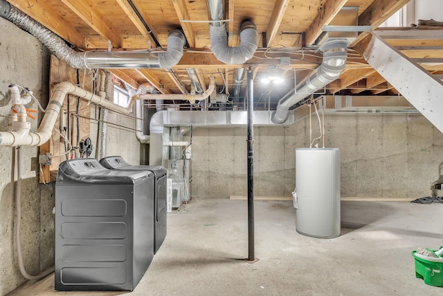 basement featuring separate washer and dryer and water heater