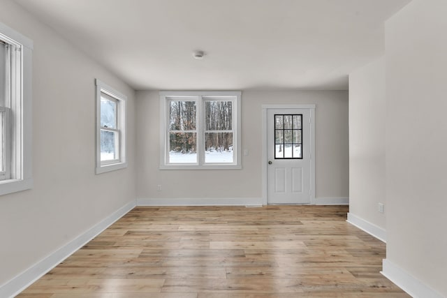 foyer featuring light wood-type flooring