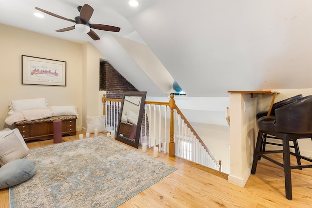 bonus room featuring vaulted ceiling, ceiling fan, and light wood-type flooring