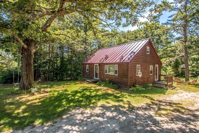 view of property exterior featuring a lawn