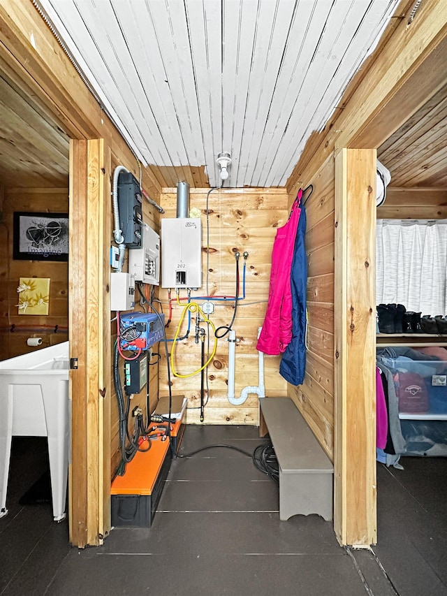 interior space with sink and water heater