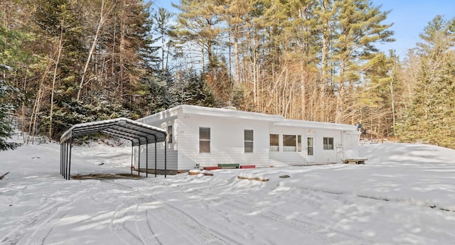 view of front of house with a carport