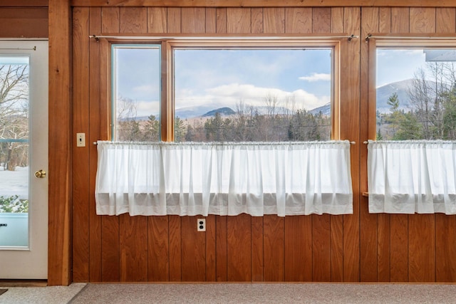 interior space featuring a mountain view and plenty of natural light