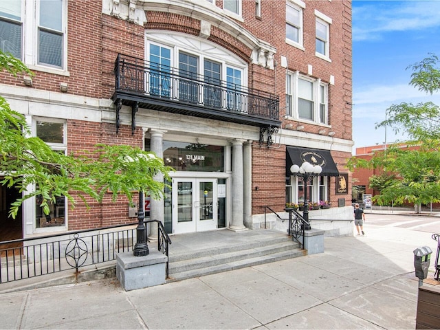 entrance to property featuring french doors