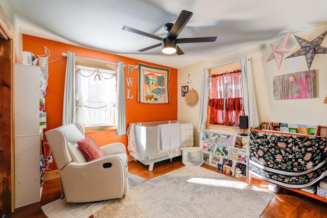 interior space featuring hardwood / wood-style floors and ceiling fan