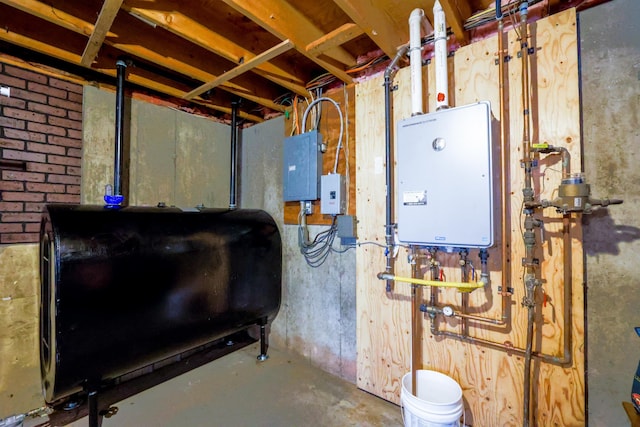 basement with water heater and electric panel