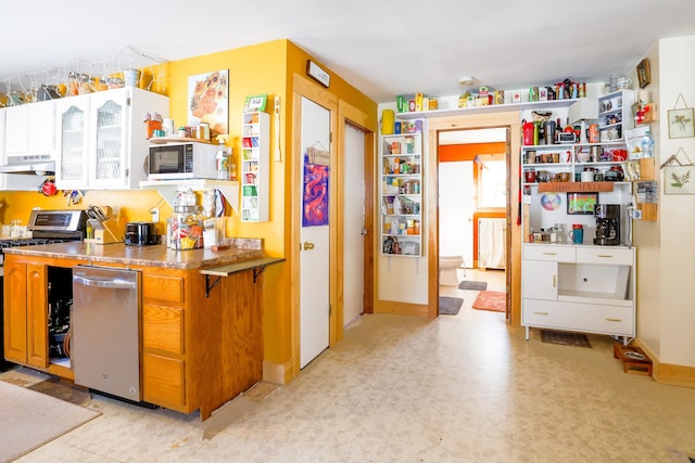 kitchen featuring stainless steel gas stove