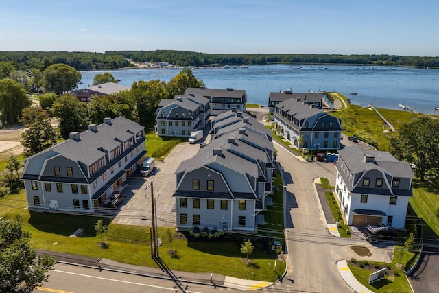 drone / aerial view with a water view