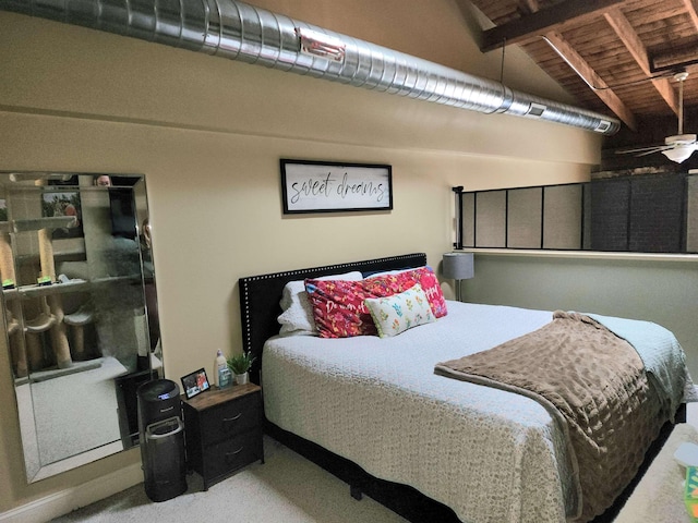 bedroom featuring light colored carpet, lofted ceiling with beams, and wooden ceiling