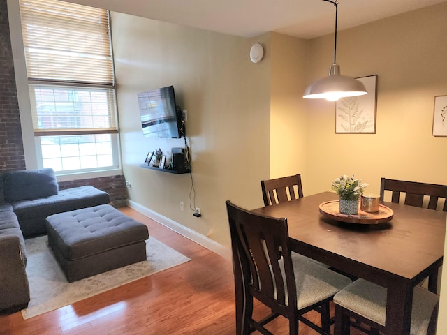 dining space featuring hardwood / wood-style floors