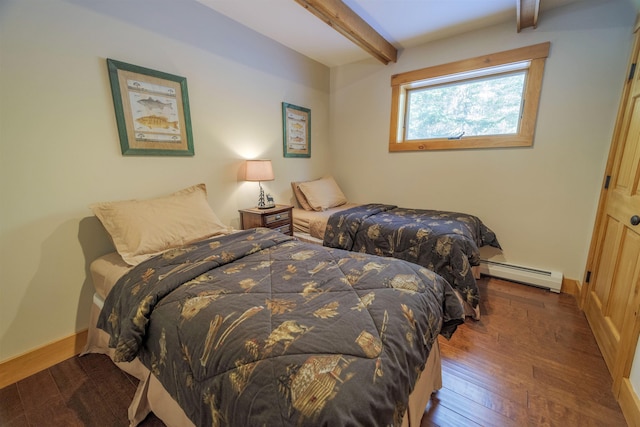 bedroom with a baseboard heating unit, dark wood-type flooring, and beam ceiling