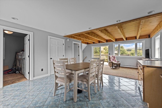 tiled dining room featuring beam ceiling, wooden ceiling, and baseboard heating