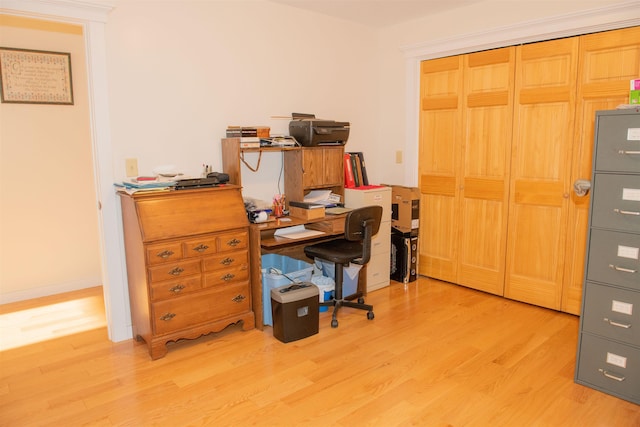 office space with light hardwood / wood-style floors