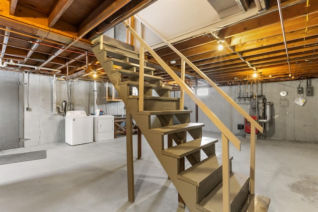 basement with washing machine and dryer