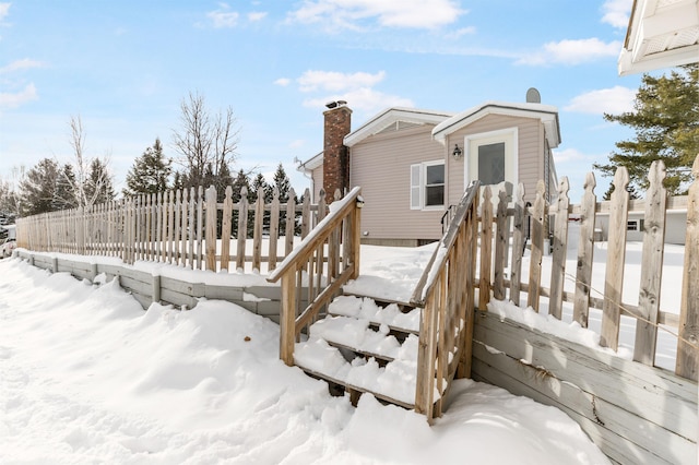 view of snow covered deck