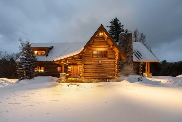 view of log cabin