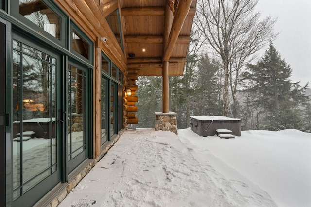 exterior space featuring a hot tub