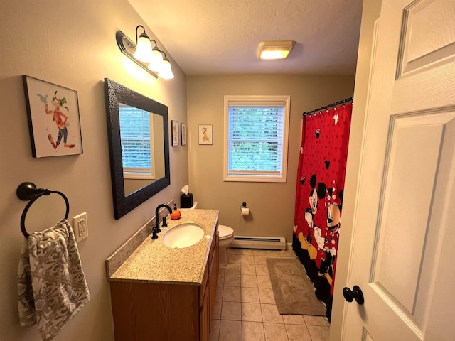 bathroom with tile patterned floors, toilet, a textured ceiling, baseboard heating, and vanity