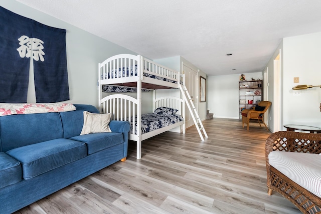 bedroom featuring hardwood / wood-style floors