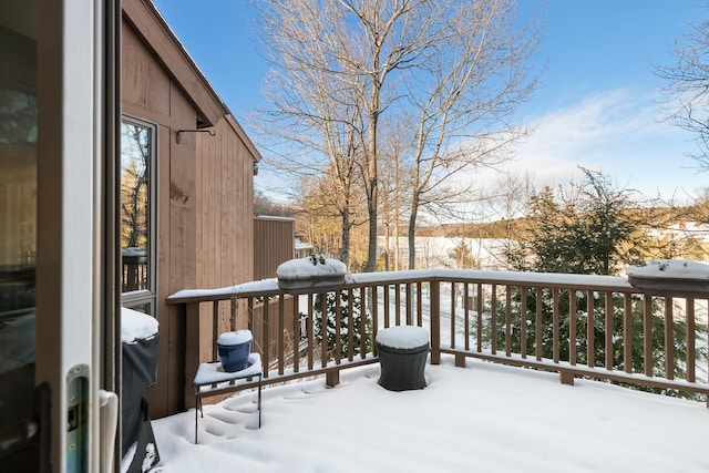 view of snow covered deck