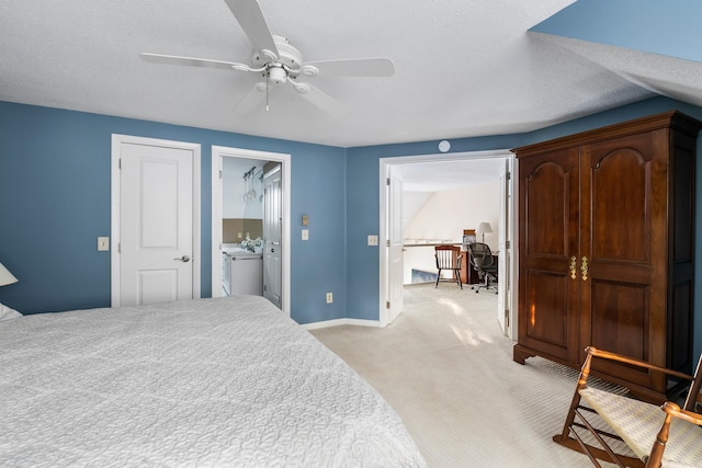 bedroom with light carpet, ceiling fan, and a textured ceiling